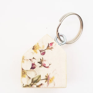 House Key Chain Painted with White Blossom Pattern Reverse
