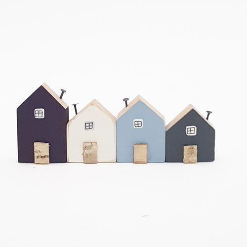 Little Wooden Houses that sit on Shelf