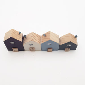 Little Wooden Houses that sit on Shelf